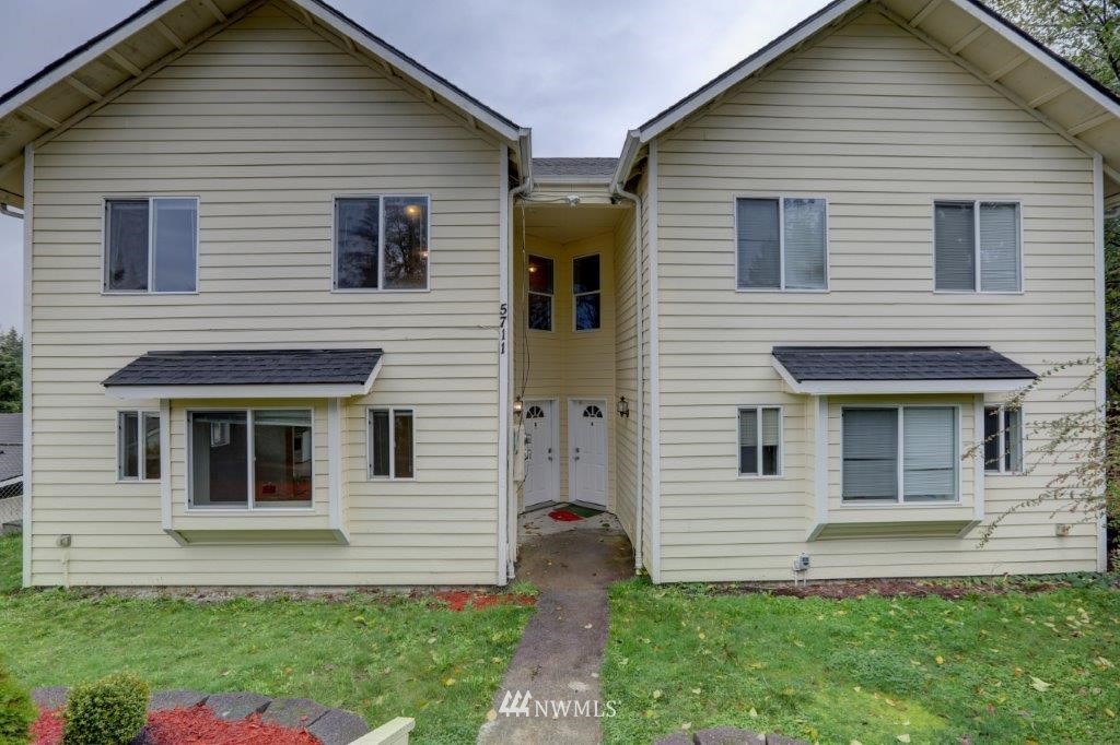 5711 Cady Road Everett, WA 98203 - Photo 1 of 15 a front view of a house with a yard