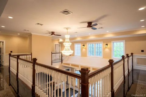 a view of a hallway with workspace