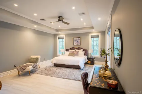 a bedroom with bed and window