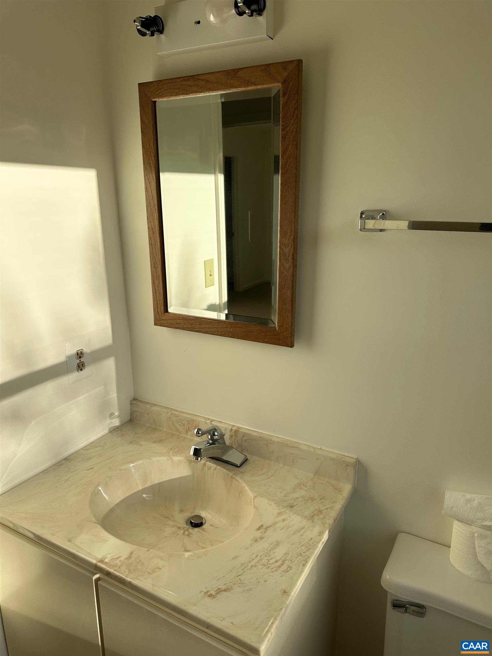 Foxfield Track Charlottesville, VA 22901 - Photo 18 of 26 a bathroom with a sink and mirror