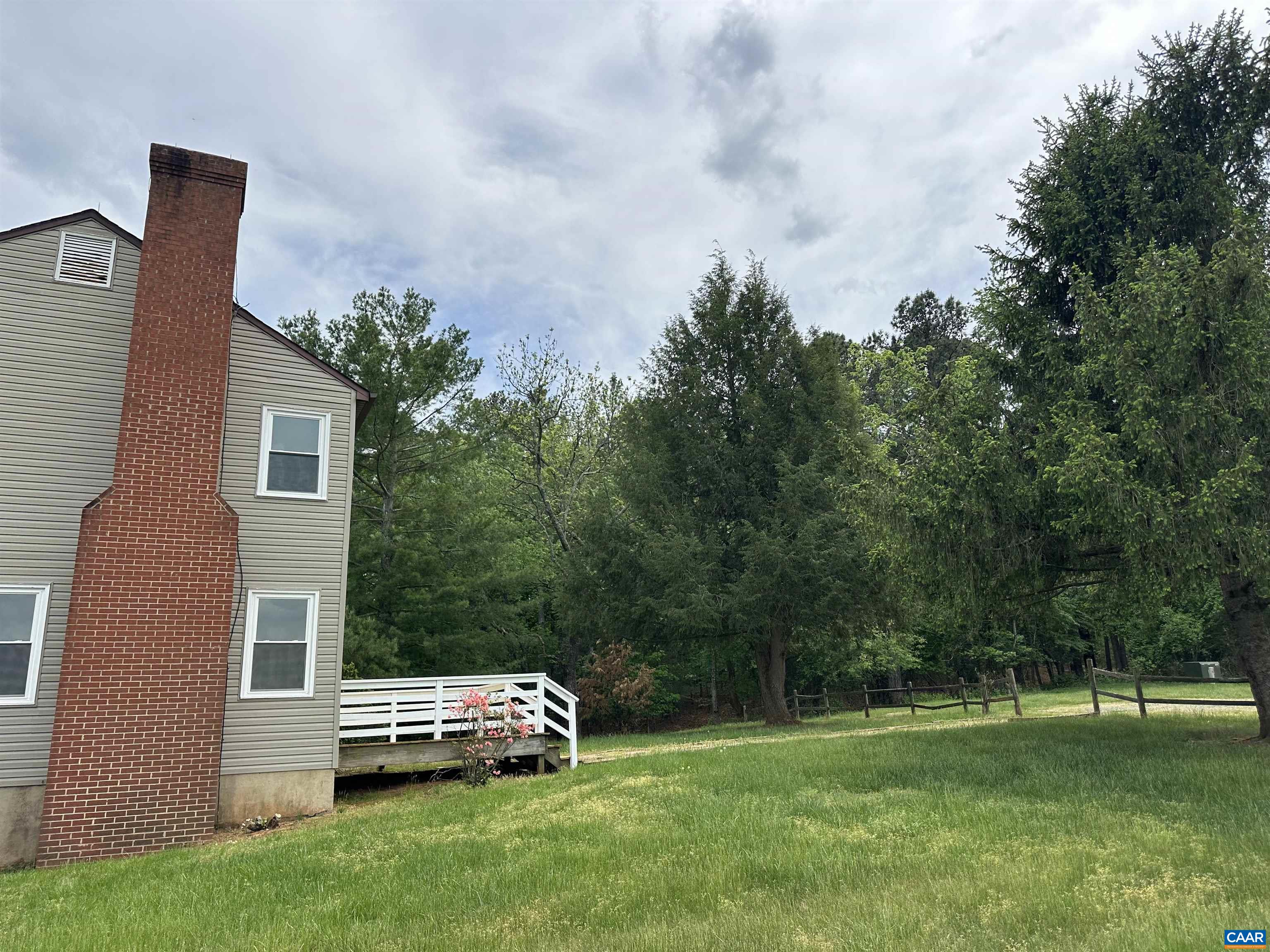 Foxfield Track Charlottesville, VA 22901 - Photo 8 of 26 a front view of a house with a garden