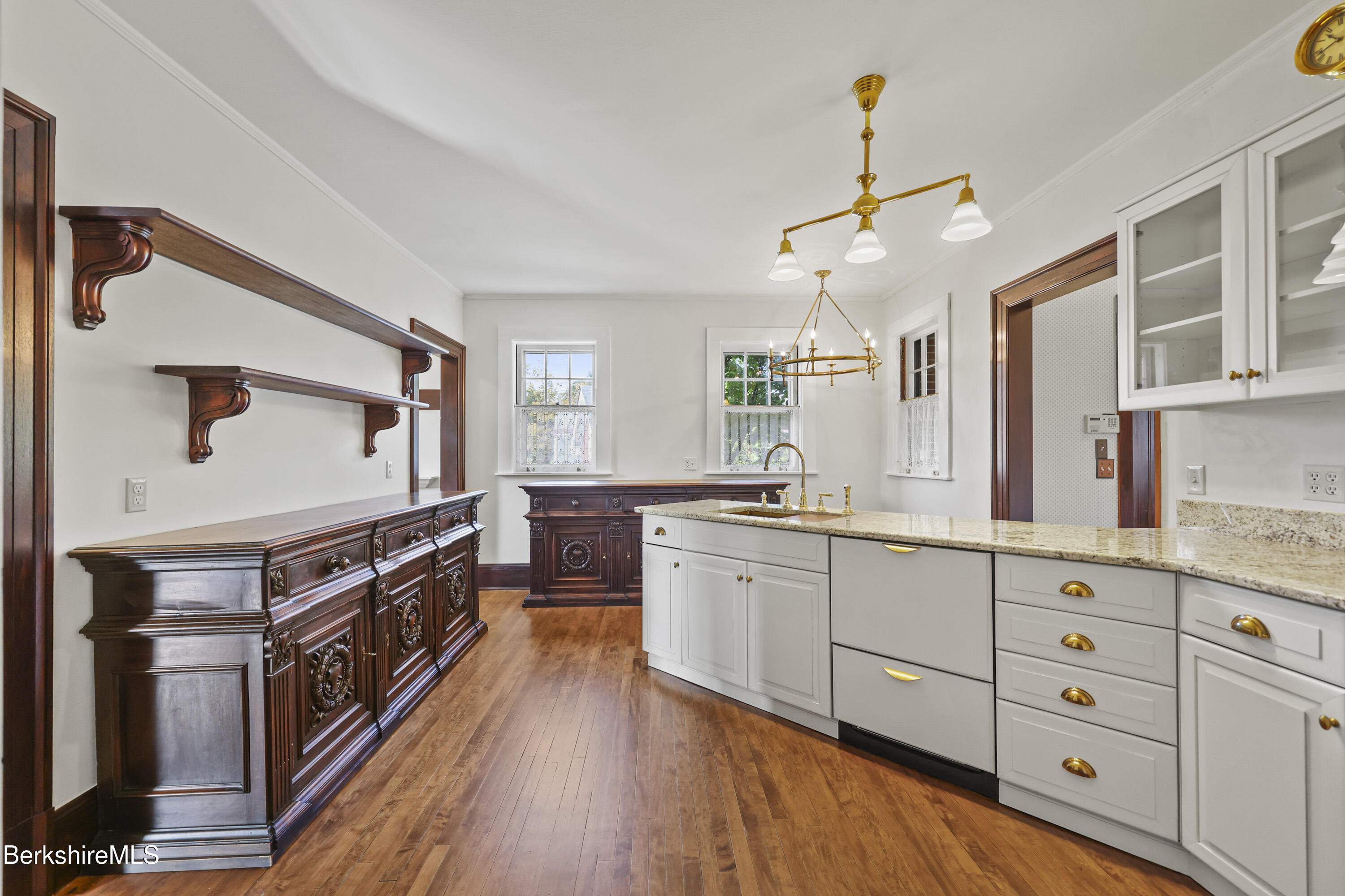 5 Crofut Street Pittsfield, MA 01201 - Photo 12 of 63 a kitchen with stainless steel appliances granite countertop a stove and a sink