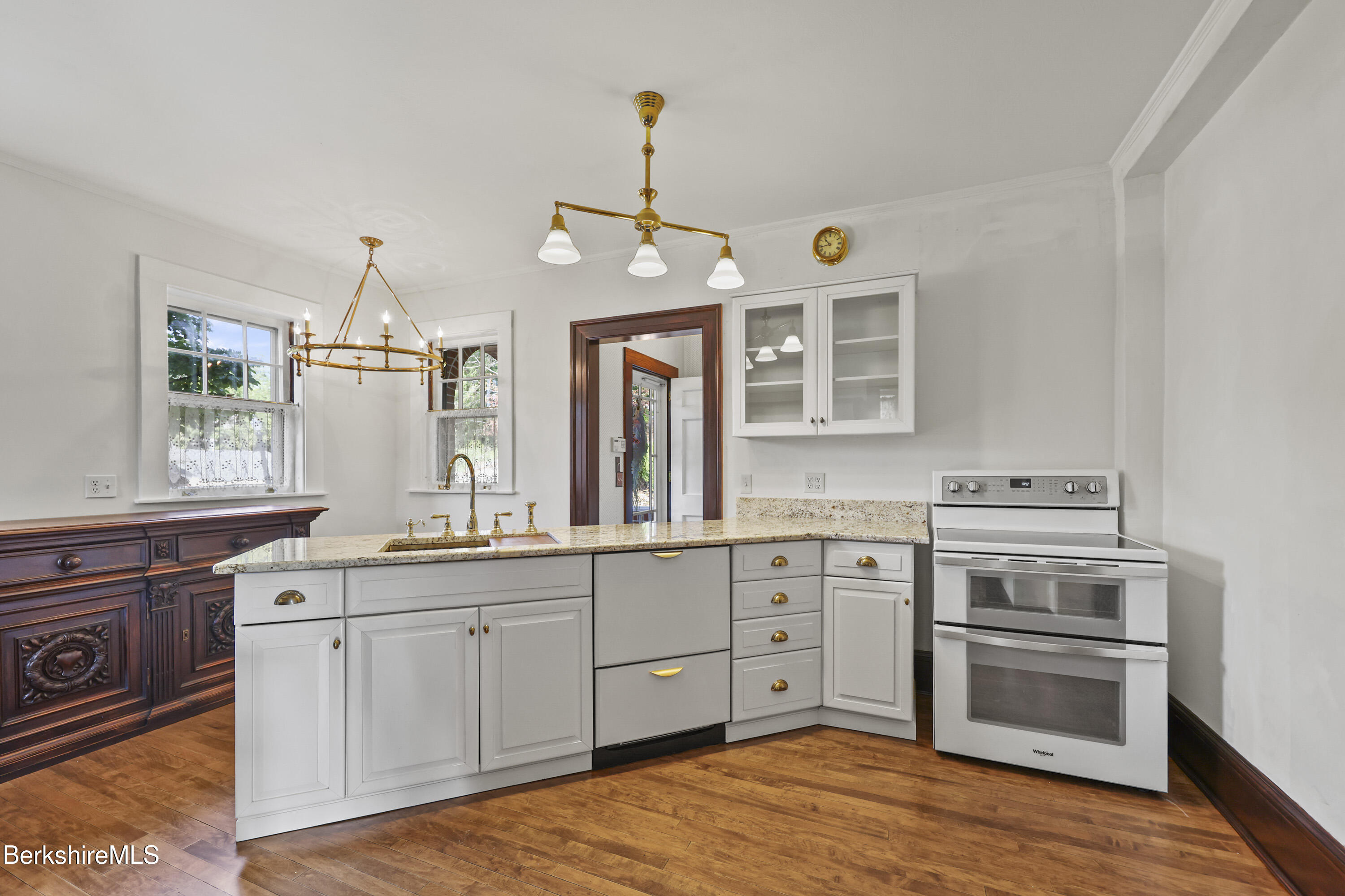5 Crofut Street Pittsfield, MA 01201 - Photo 14 of 63 a kitchen with a sink stove and cabinets