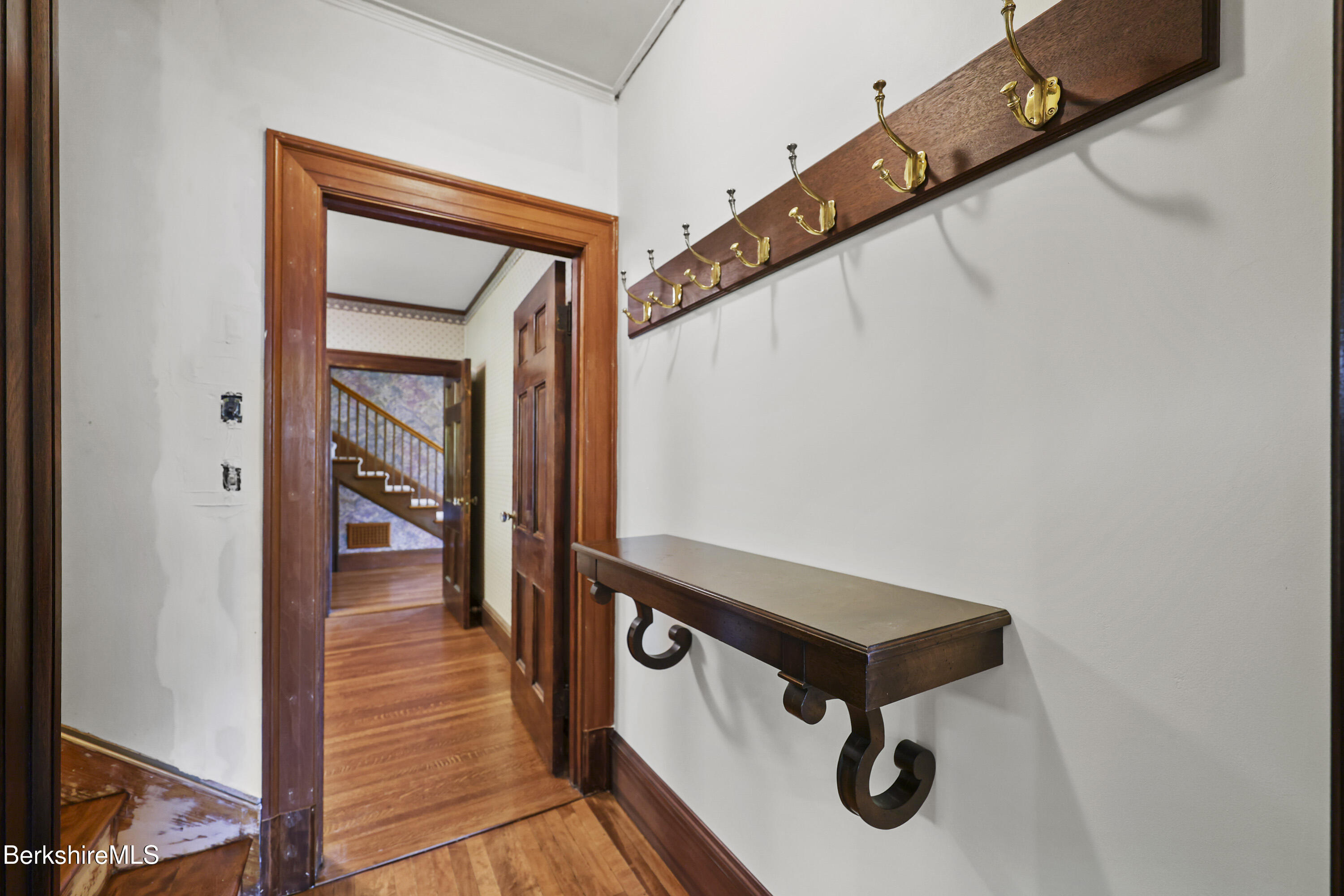 5 Crofut Street Pittsfield, MA 01201 - Photo 20 of 63 a view of a hallway with wooden floor