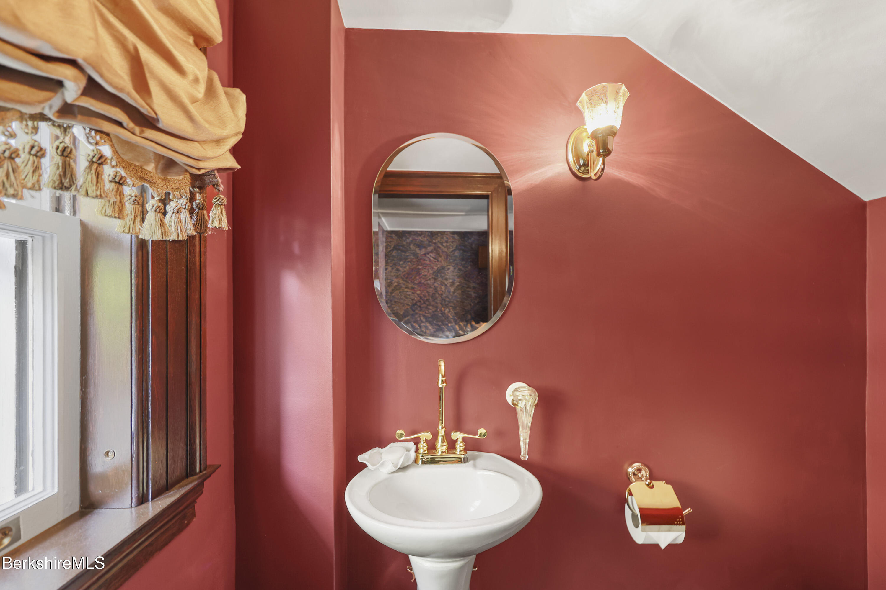 5 Crofut Street Pittsfield, MA 01201 - Photo 23 of 63 a bathroom with a sink and a mirror