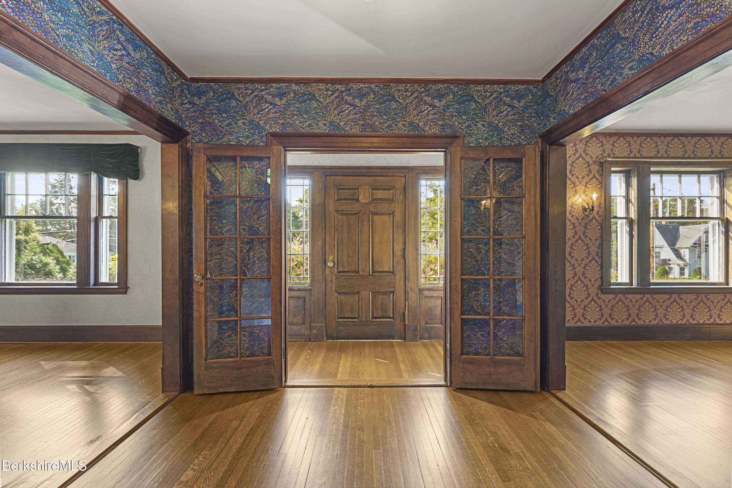 5 Crofut Street Pittsfield, MA 01201 - Photo 5 of 63 wooden floor in an empty room with a window