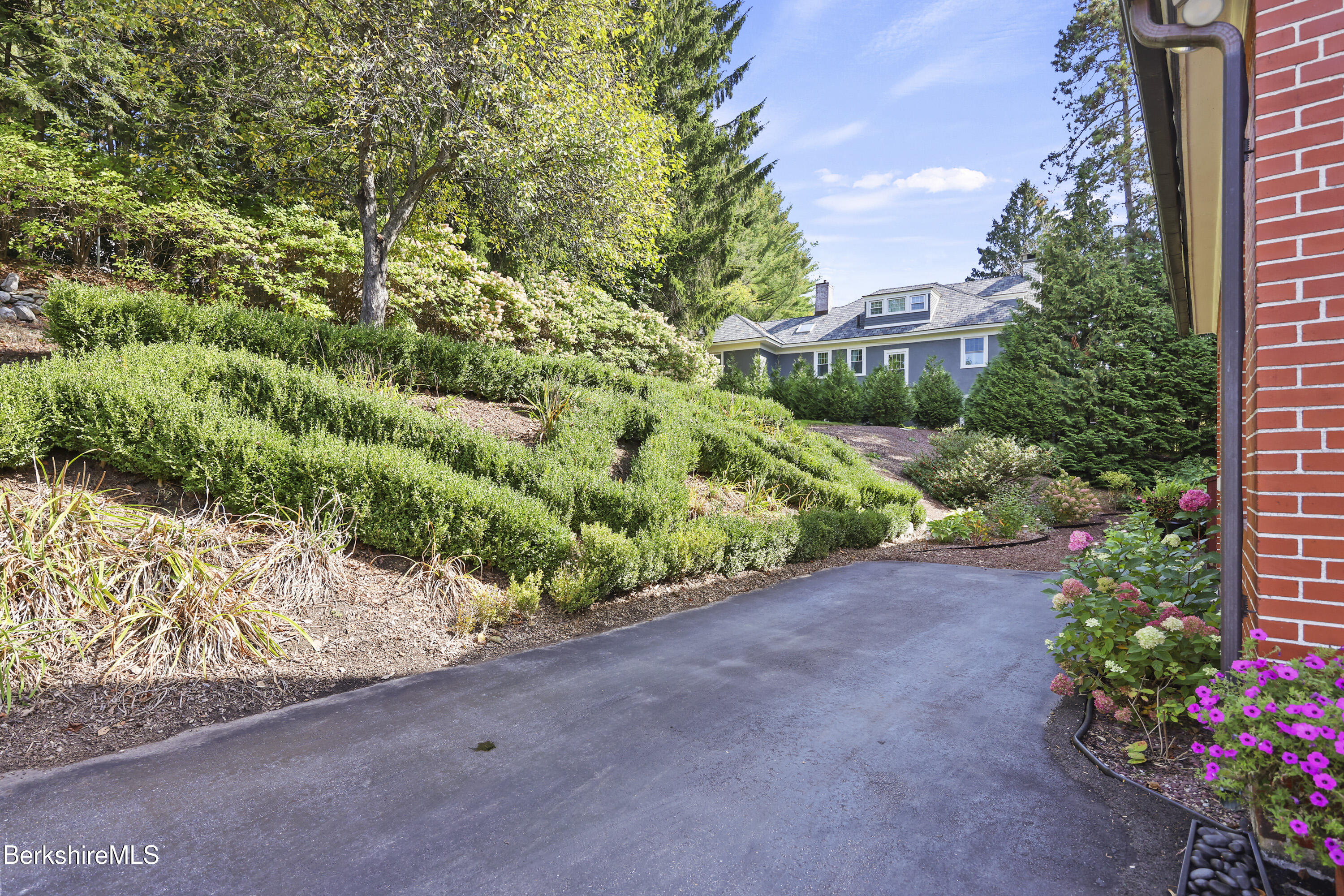5 Crofut Street Pittsfield, MA 01201 - Photo 54 of 63 a view of a garden with a house
