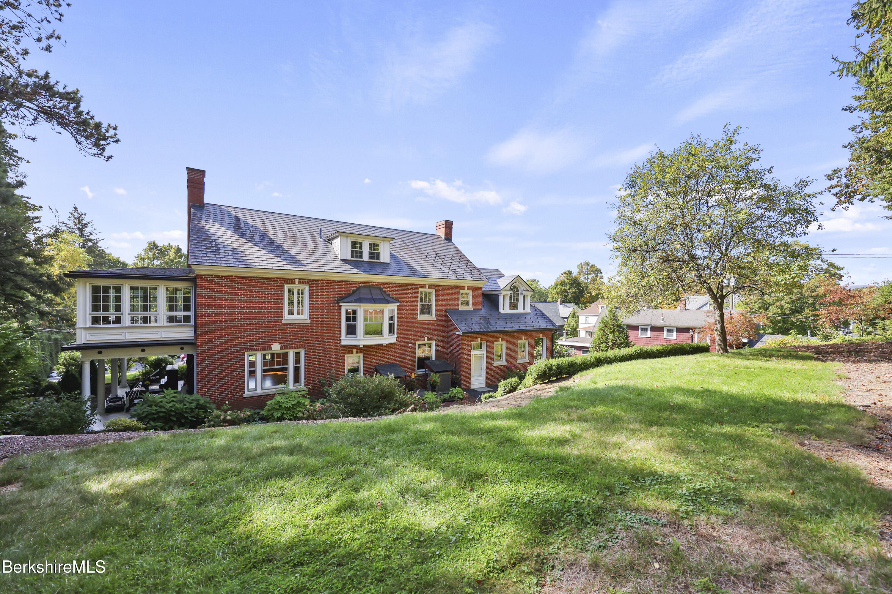 5 Crofut Street Pittsfield, MA 01201 - Photo 56 of 63 a front view of a house with garden