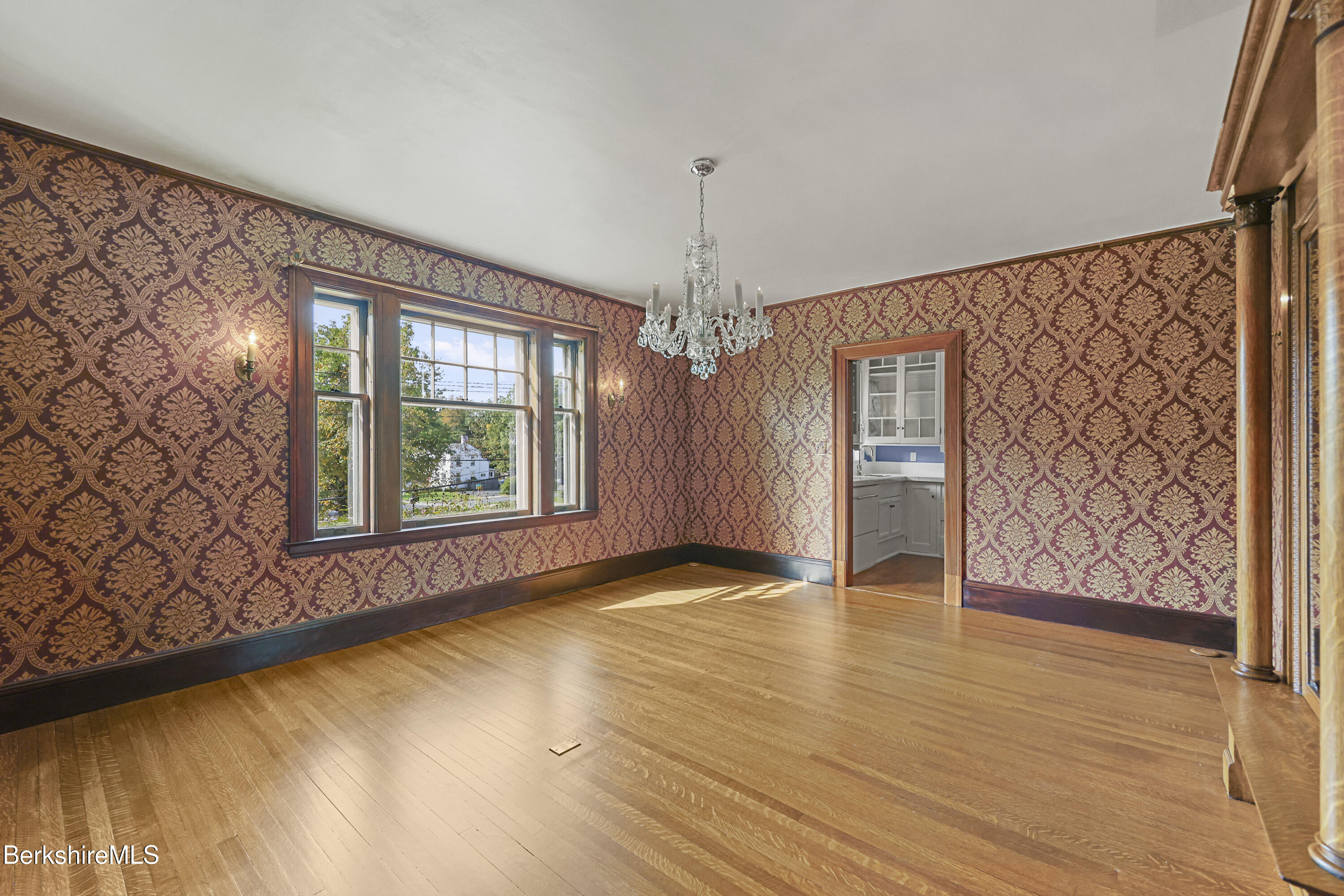 5 Crofut Street Pittsfield, MA 01201 - Photo 9 of 63 a view of an empty room with window and wooden floor