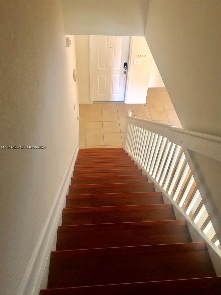 9041 Southwest 227th Street, Unit 5 Cutler Bay, FL 33190 - Photo 8 of 27 a view of entryway
