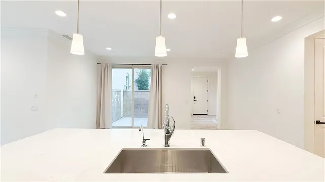 a large bathroom with a large tub sink and shower