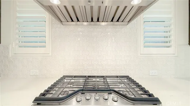 a view of a utility room with windows