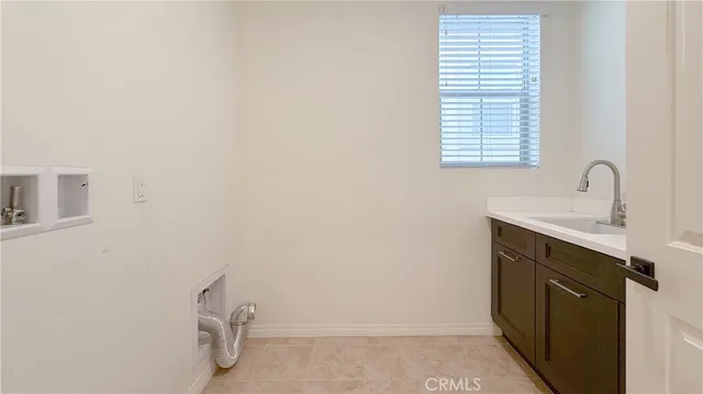 a bathroom with a sink and a vanity