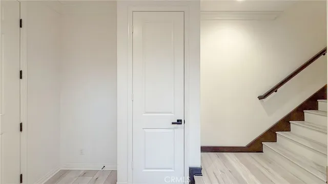 a view of entryway with wooden floor