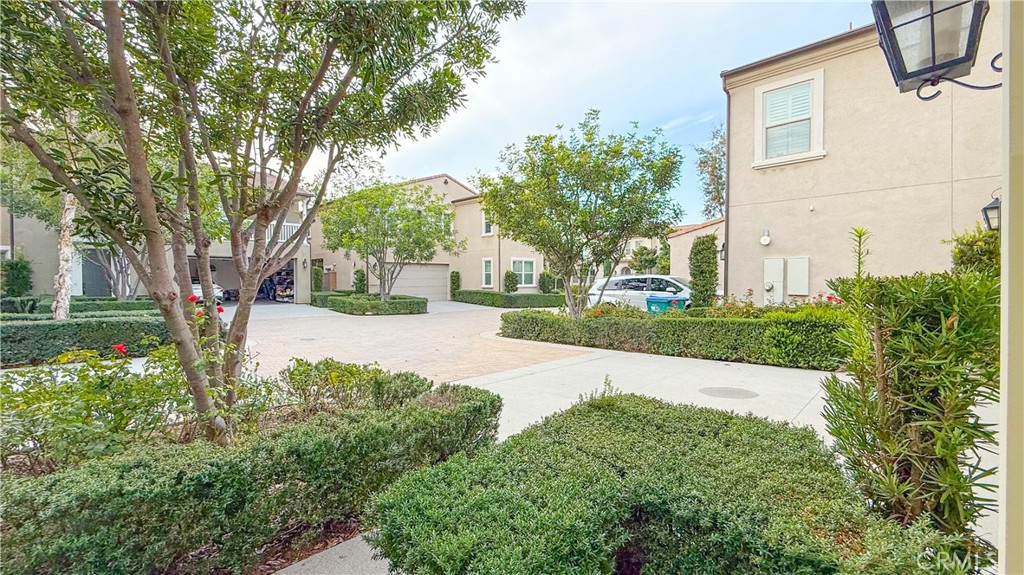 140 Hemisphere Irvine, CA 92618 - Photo 41 of 46 a view of a yard with plants and a large tree
