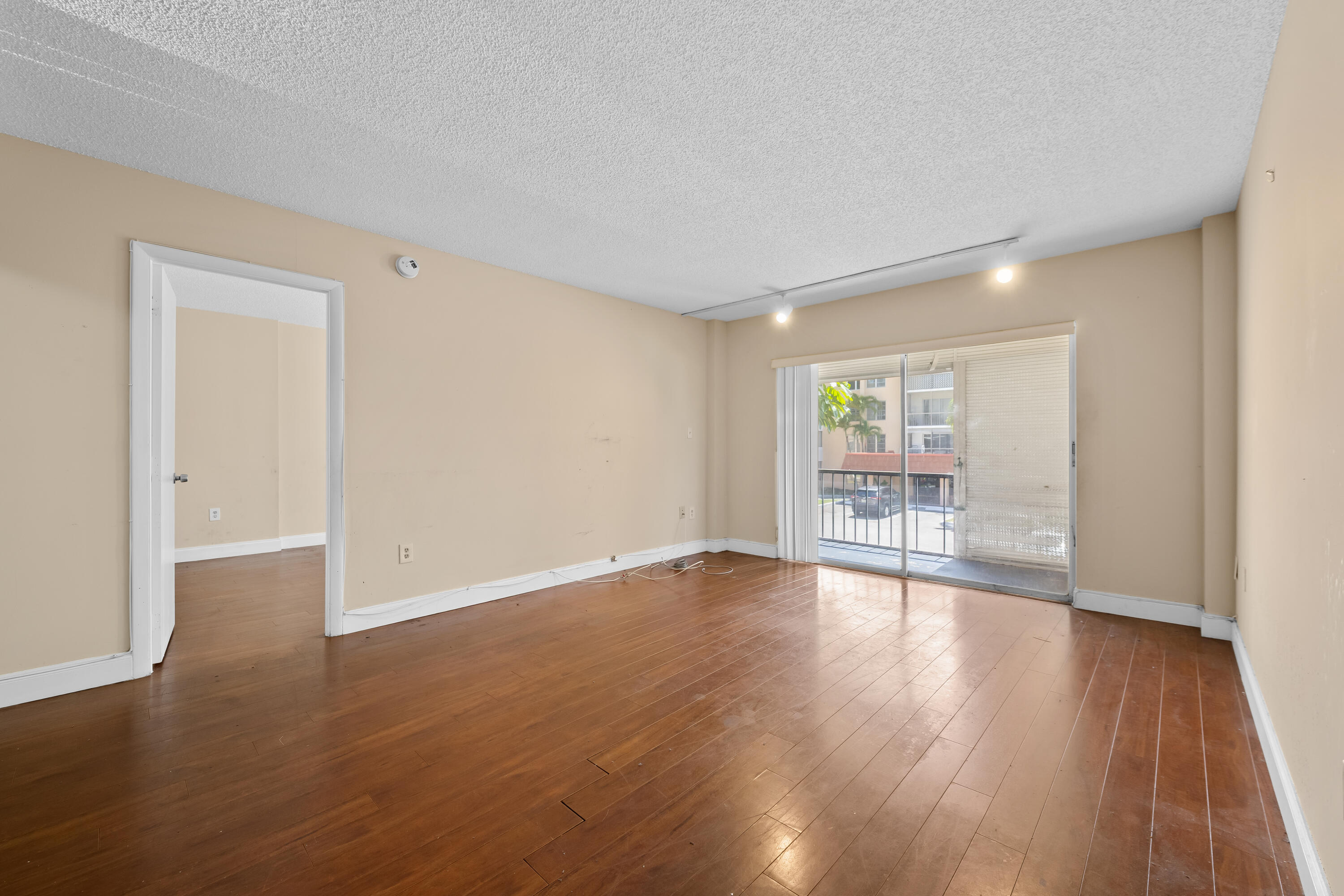 4156 Inverrary Drive, Unit 210 Lauderhill, FL 33319 - Photo 17 of 27 a view of empty room with wooden floor