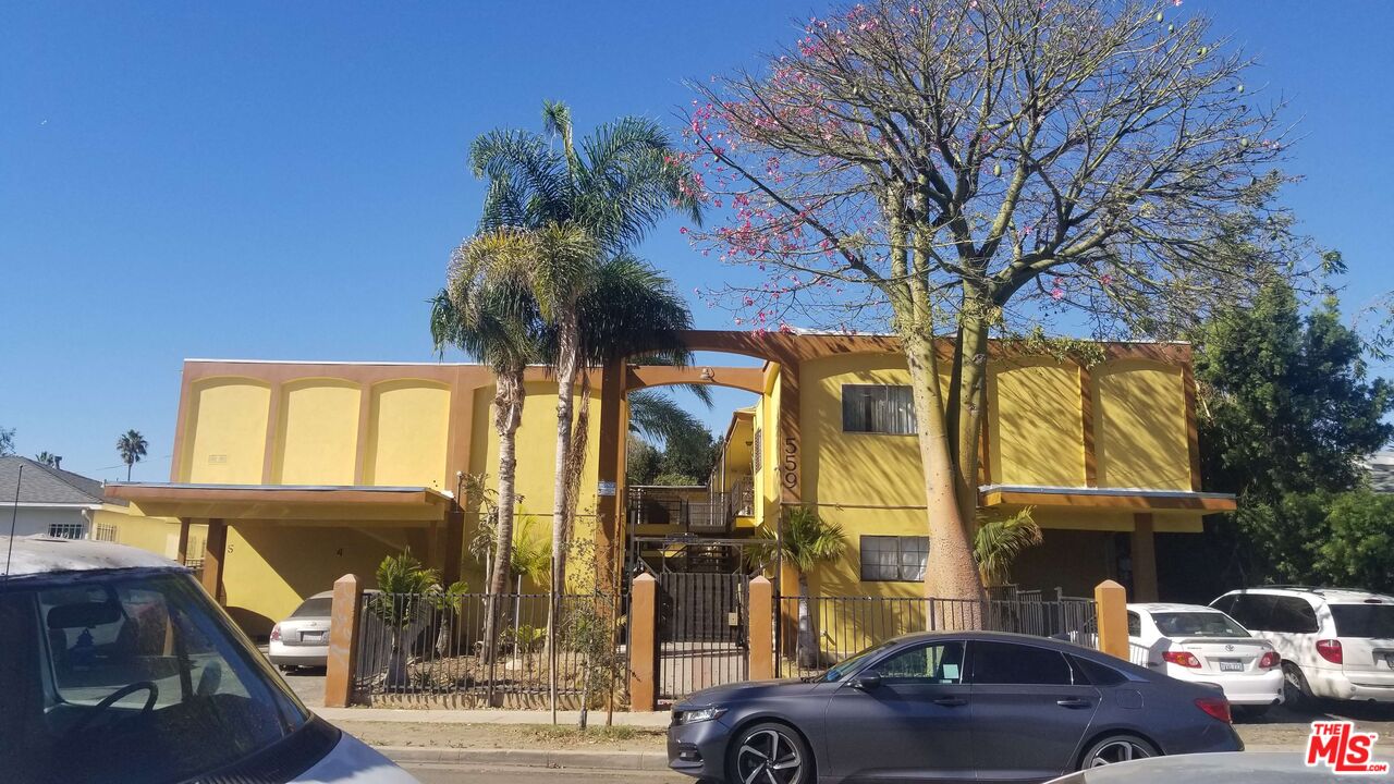 559 Sunset Avenue Venice, CA 90291 - Photo 6 of 10 a couple of cars parked in front of a house