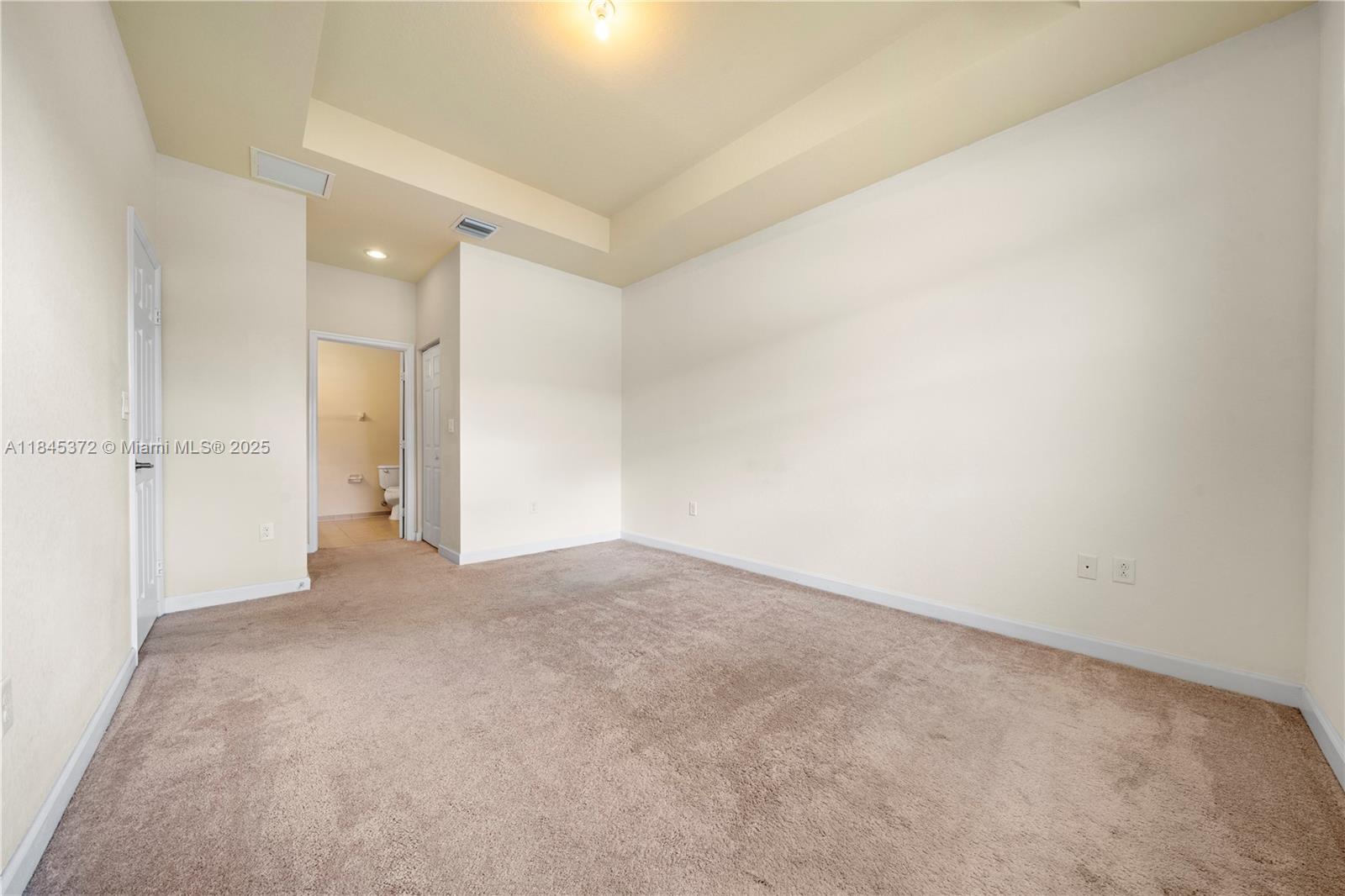 3366 West 90th Terrace, Unit 3366 Hialeah, FL 33018 - Photo 18 of 26 a view of an empty room