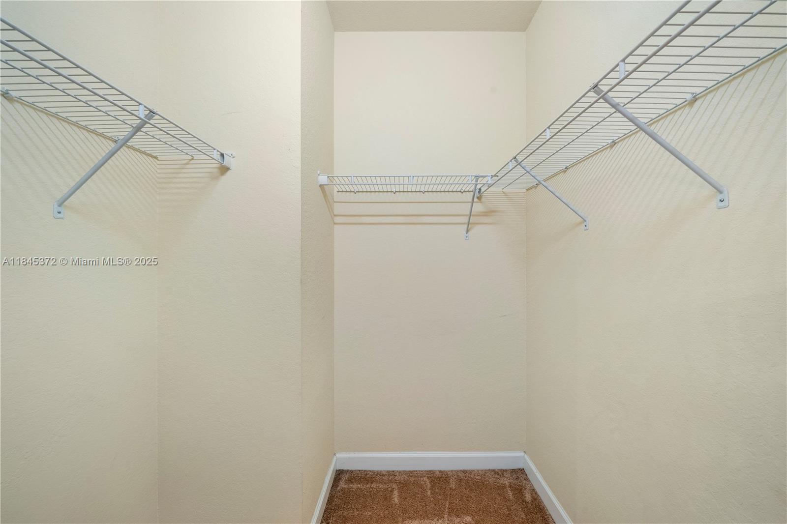 3366 West 90th Terrace, Unit 3366 Hialeah, FL 33018 - Photo 23 of 26 a view of small space with racks on the wall