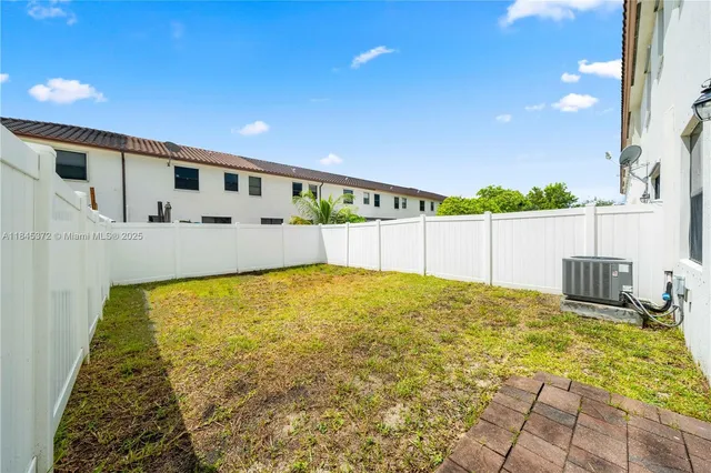 a swimming pool with yard