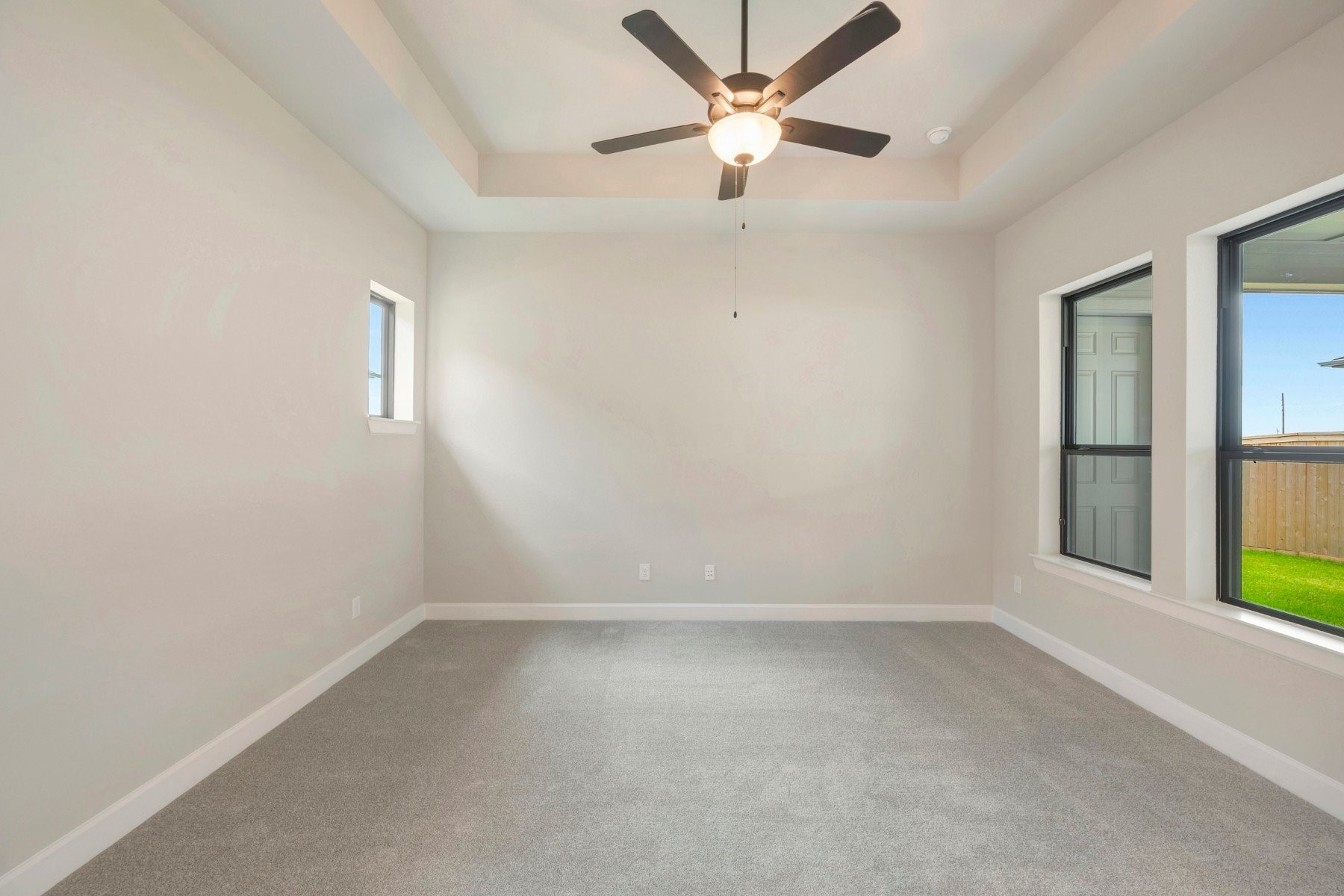 2722 Cottage Place Rosharon, TX 77583 - Photo 38 of 50 an empty room with a window and a ceiling fan