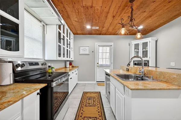 workspace with wooden floor and windows