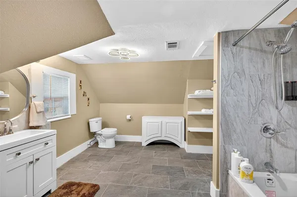 a view of a backyard of a house