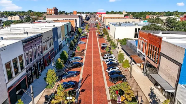 a view of a city with tall buildings