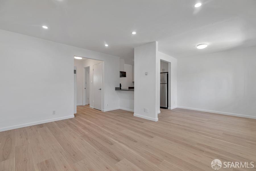 46728 Crawford Street, Unit 2 Fremont, CA 94539 - Photo 16 of 39 a view of an empty room with wooden floor
