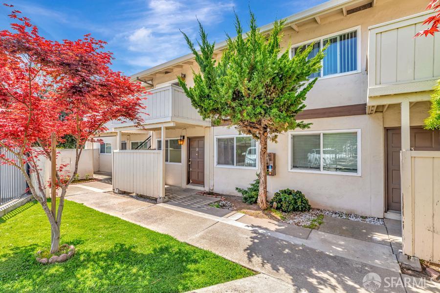 46728 Crawford Street, Unit 2 Fremont, CA 94539 - Photo 2 of 39 a front view of a house with garden