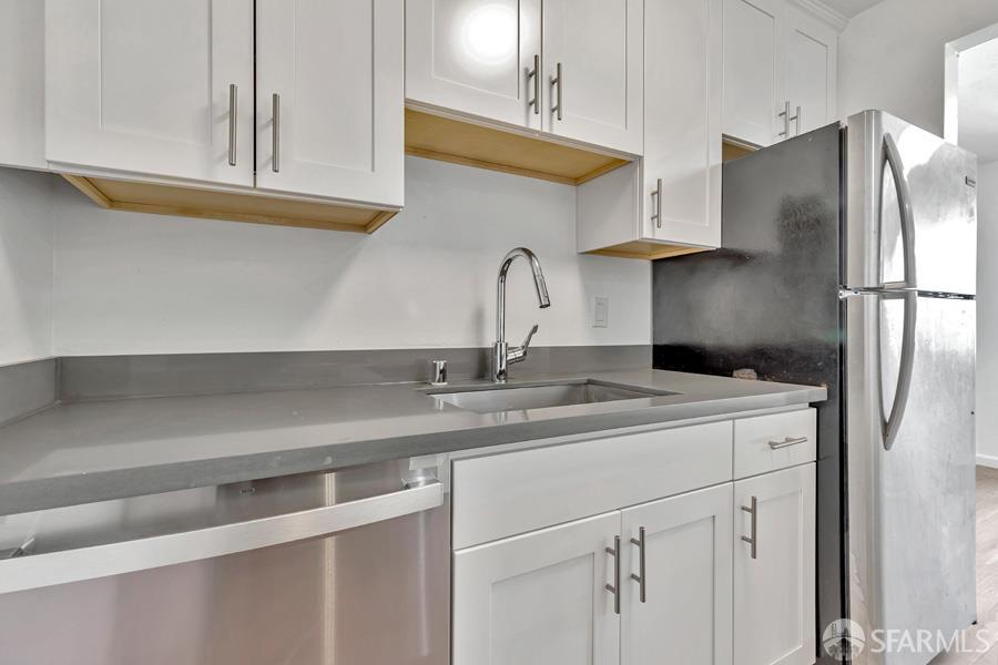 46728 Crawford Street, Unit 2 Fremont, CA 94539 - Photo 24 of 39 a kitchen with appliances cabinets and a sink