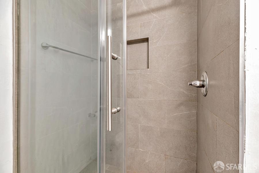 46728 Crawford Street, Unit 2 Fremont, CA 94539 - Photo 32 of 39 a bathroom with a shower