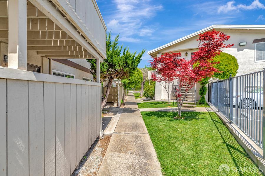 46728 Crawford Street, Unit 2 Fremont, CA 94539 - Photo 7 of 39 a view of a backyard with a garden
