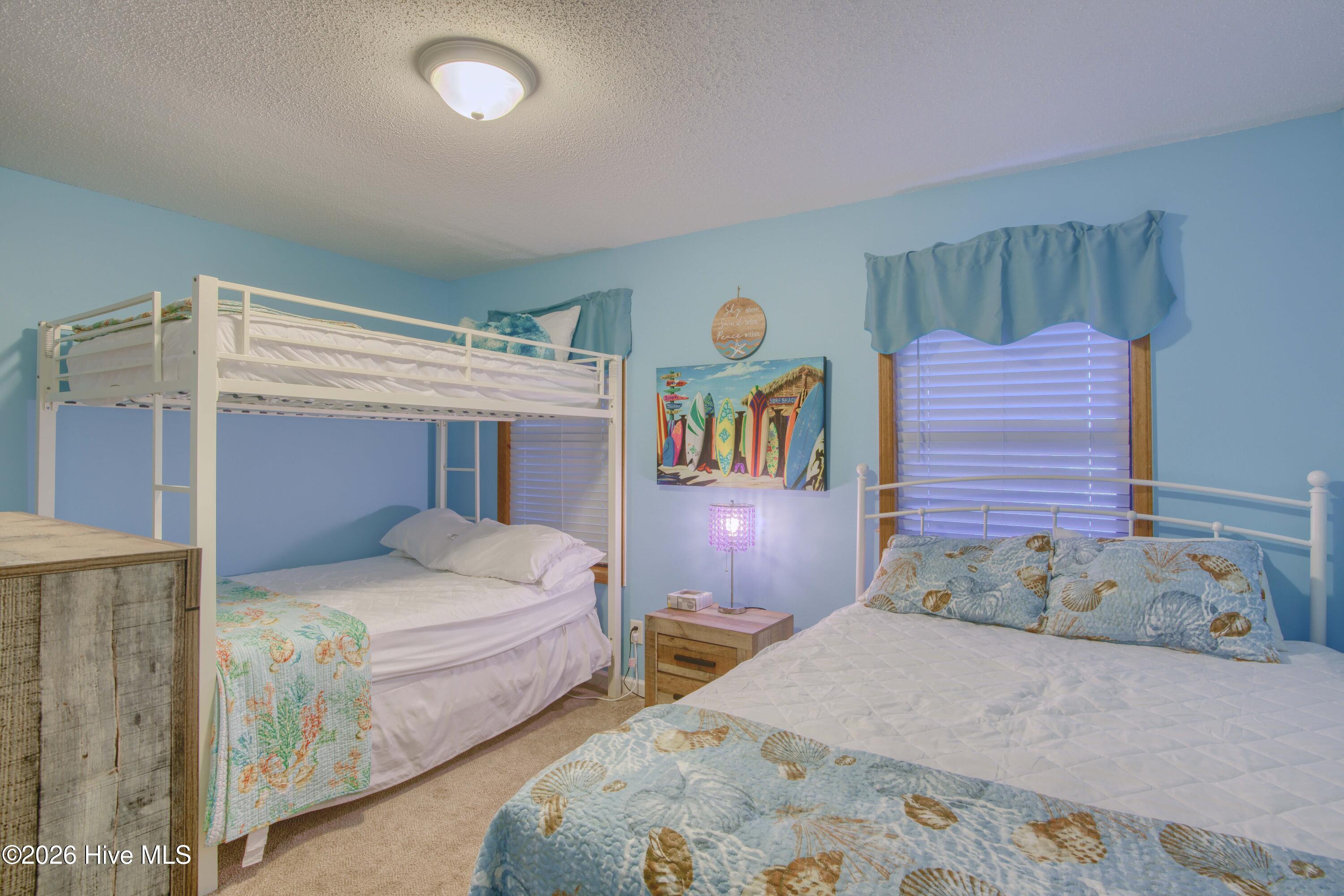 1896 New River Inlet Road, Unit 1209 North Topsail Beach, NC 28460 - Photo 32 of 50 Guest Bedroom