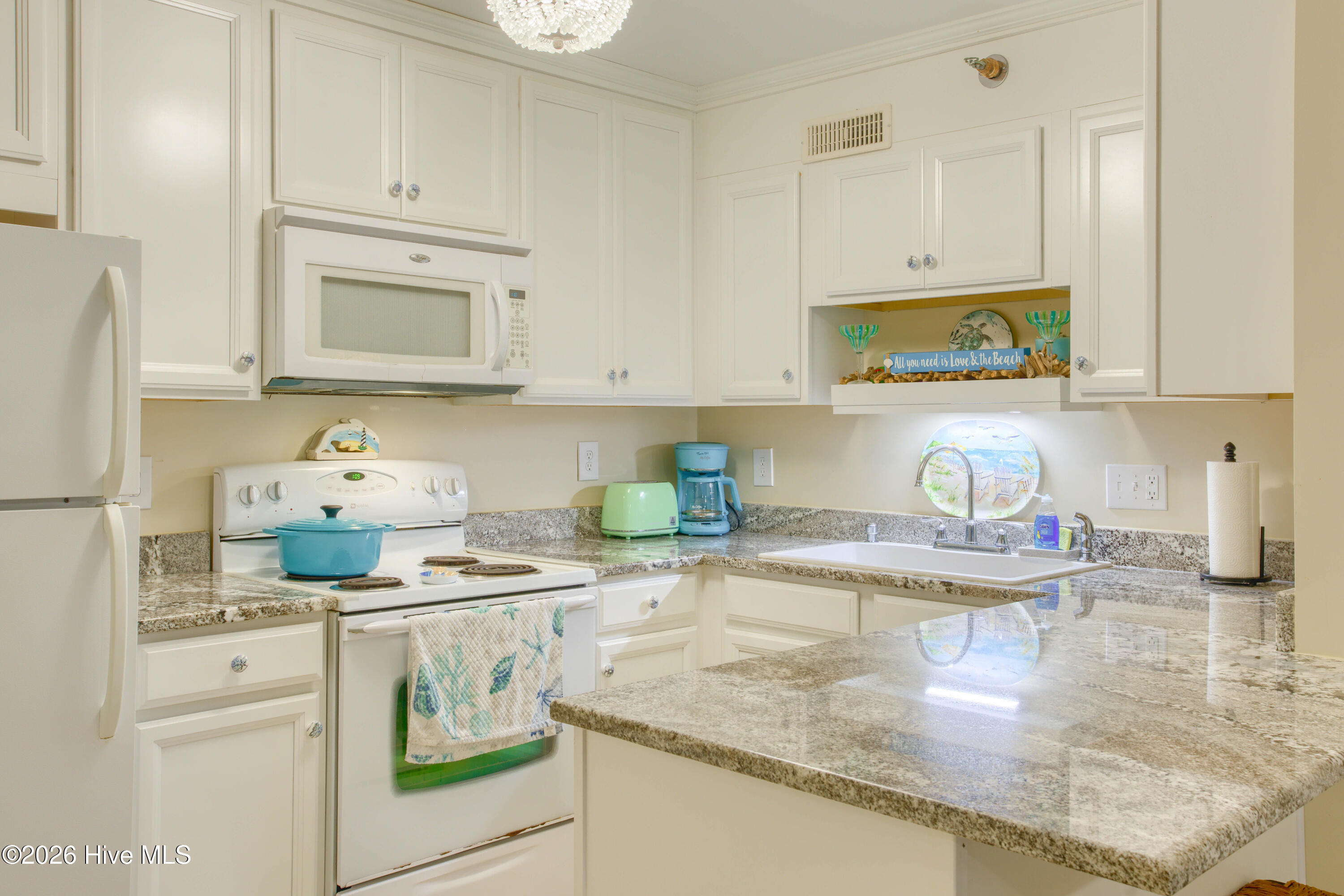 1896 New River Inlet Road, Unit 1209 North Topsail Beach, NC 28460 - Photo 7 of 38 Kitchen