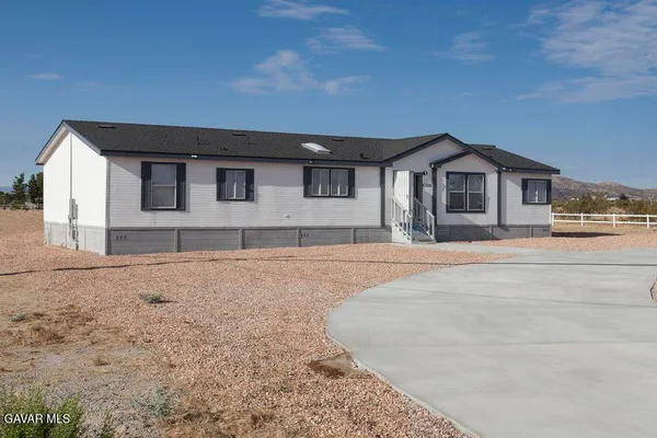a house view with a outdoor space