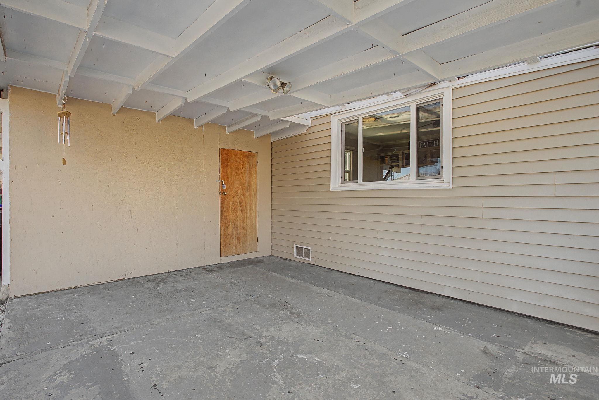 3312 5th Street Lewiston, ID 83501 - Photo 40 of 44 Carport area could also be covered front Patio area with door to workshop