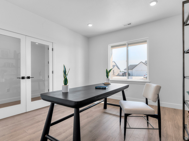 1380 West 2350 South, Unit 16 Perry, UT 84302 - Photo 6 of 34 Recessed lighting, wood-finish flooring, and a large window