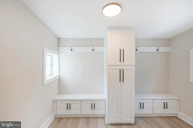a view of walk in closet with window