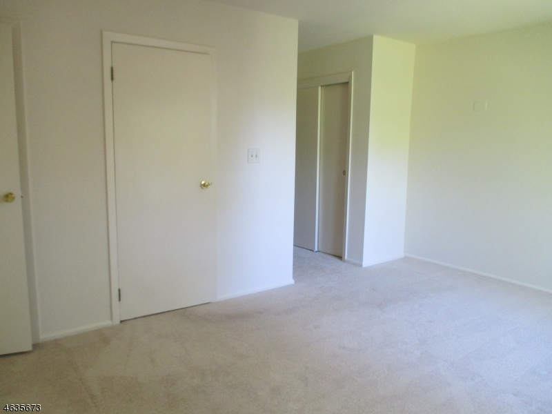 181 Long Hill Road, Unit K1 Little Falls, NJ 07424 - Photo 8 of 11 a view of an empty room