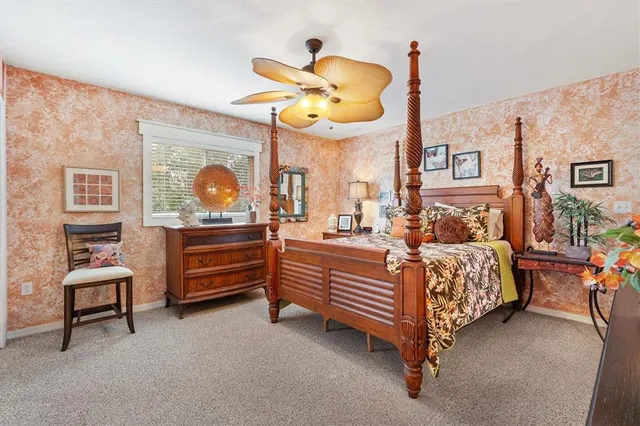 a bathroom with a shower and a sink