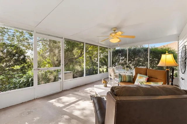 an aerial view of residential houses with swimming pool and outdoor space