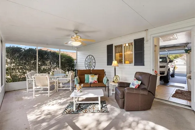an aerial view of a house with a garden and swimming pool
