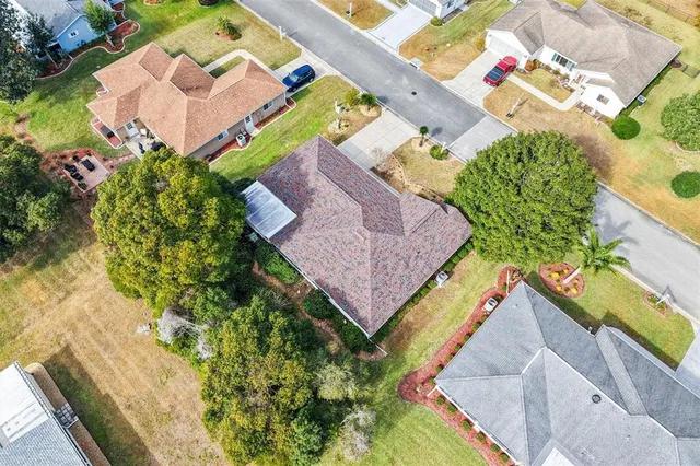 a view of a lake with houses in background