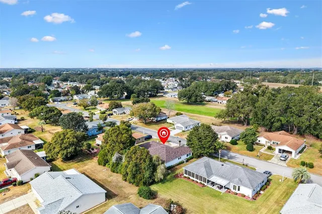 a view of an outdoor space and tennis court