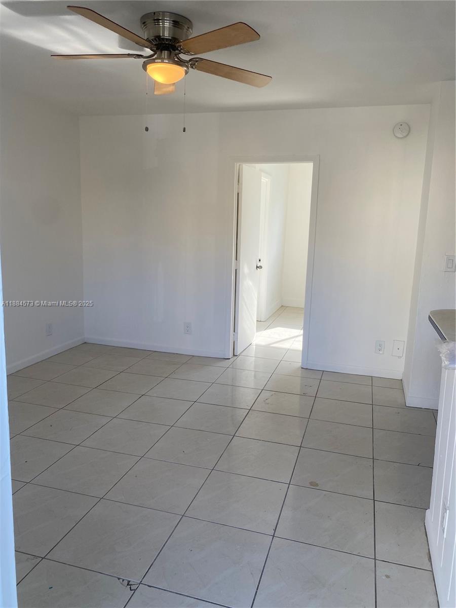 479 Southwest 3rd Street, Unit 9 Miami, FL 33130 - Photo 2 of 4 a view of an empty room with a window
