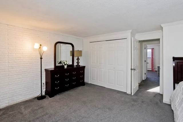 a room with a dresser and a mirror