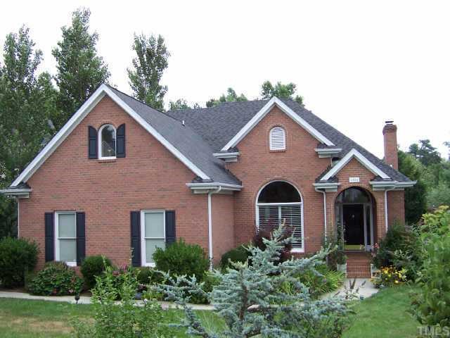 2324 Wertherson Lane Raleigh, NC 27613 - Photo 1 of 1 a front view of a house with garden