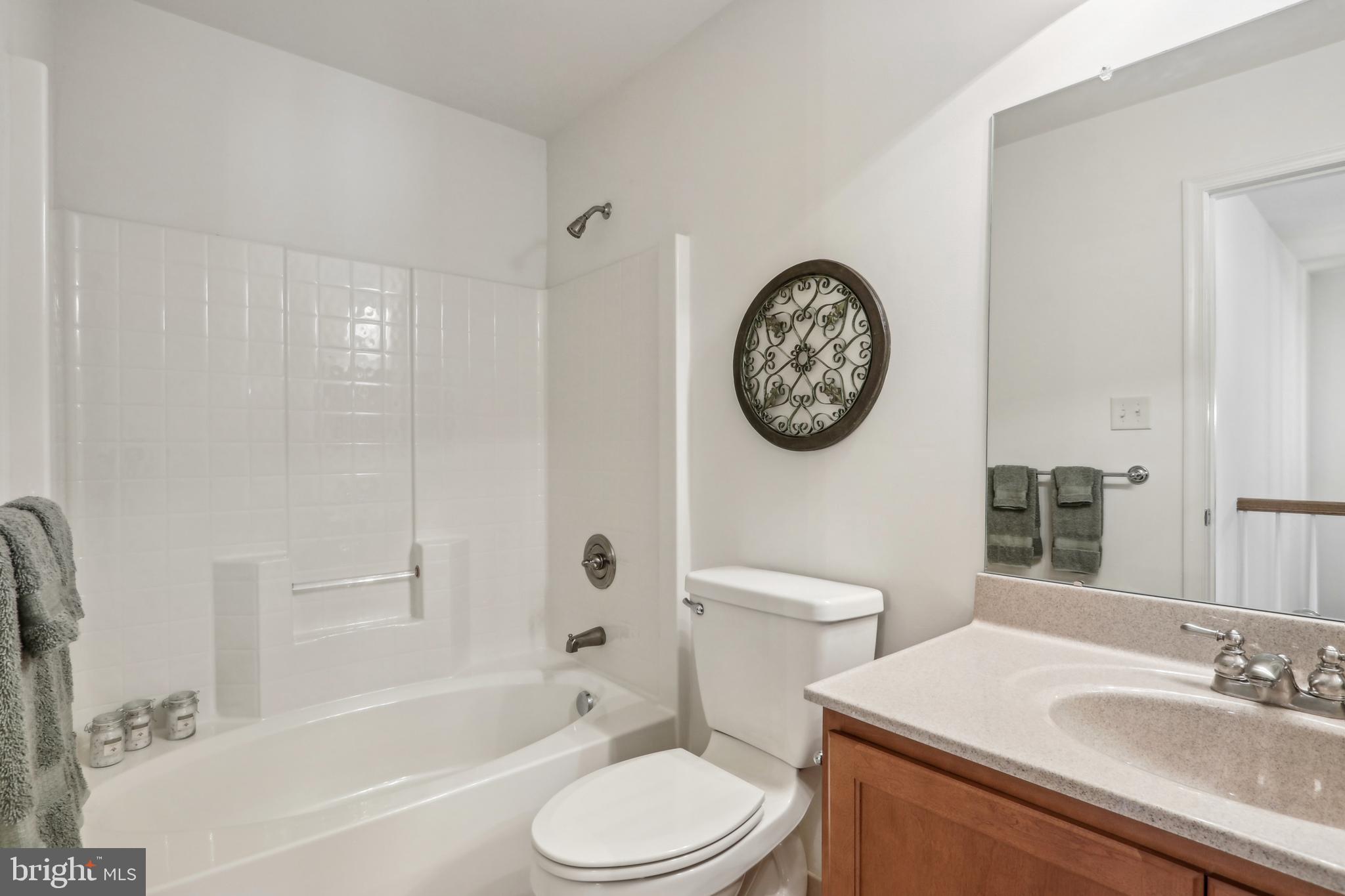 705 Ridgeview Court Sellersville, PA 18960 - Photo 12 of 21 a bathroom with a toilet a sink and a bathtub