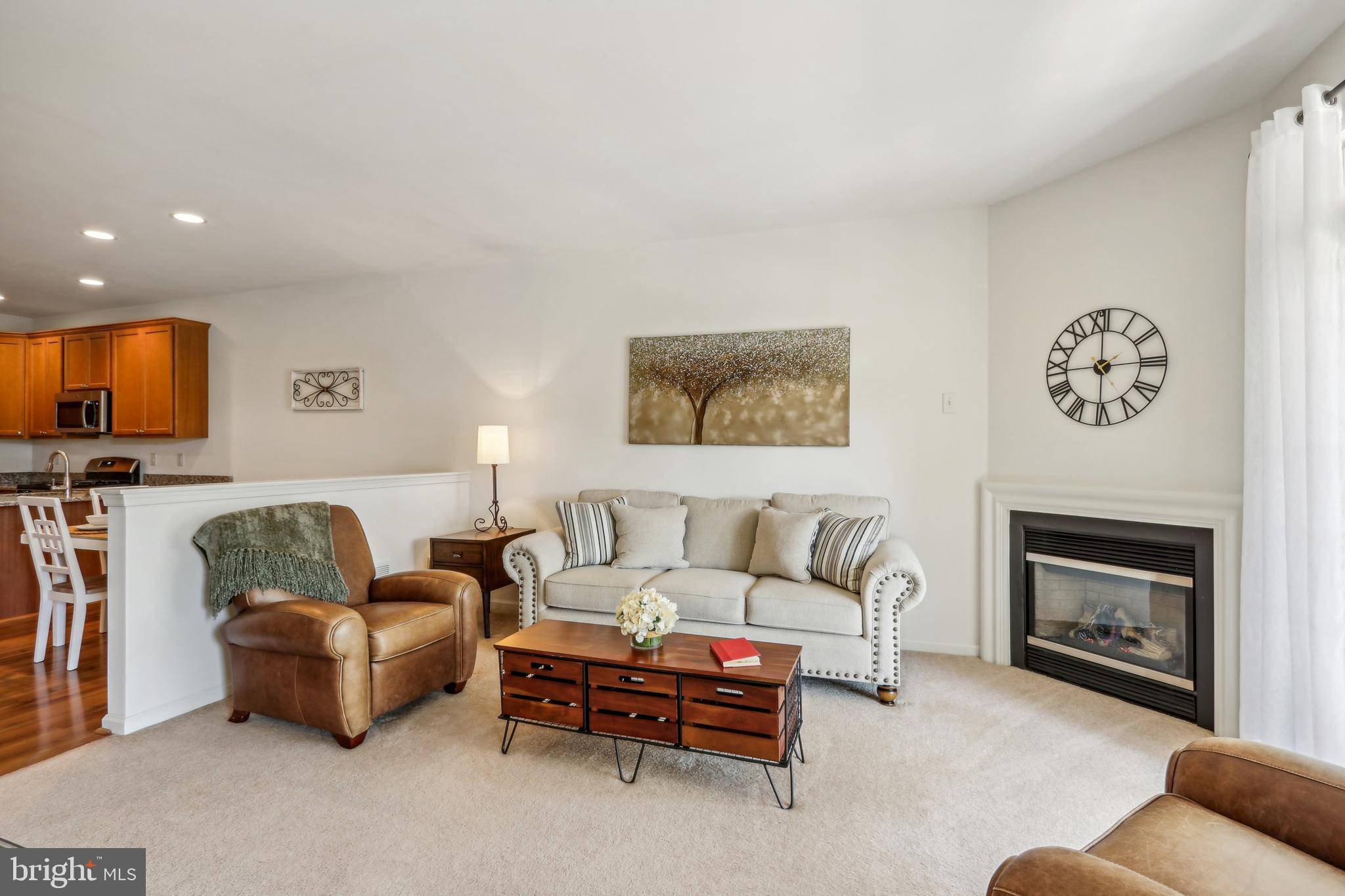 705 Ridgeview Court Sellersville, PA 18960 - Photo 6 of 21 a living room with furniture and a fireplace